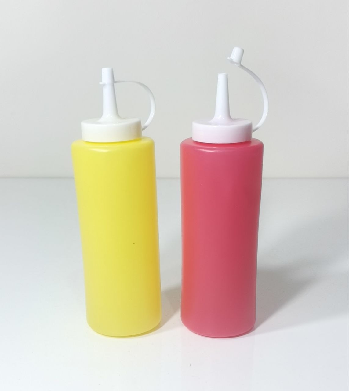 Pair of Plastic Squeeze Condiment Bottles