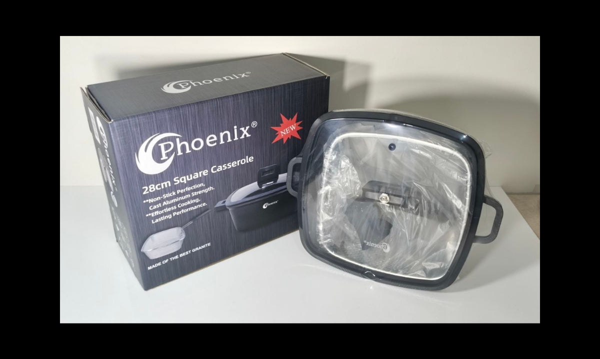 Phoenix 28cm square casserole dish with its original retail box, shown on a light-colored surface against a neutral background.