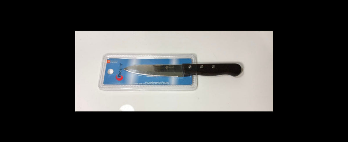 A small kitchen knife with a black handle and silver blade, still in its clear plastic packaging with a blue Phoenix brand card, placed on a white surface.